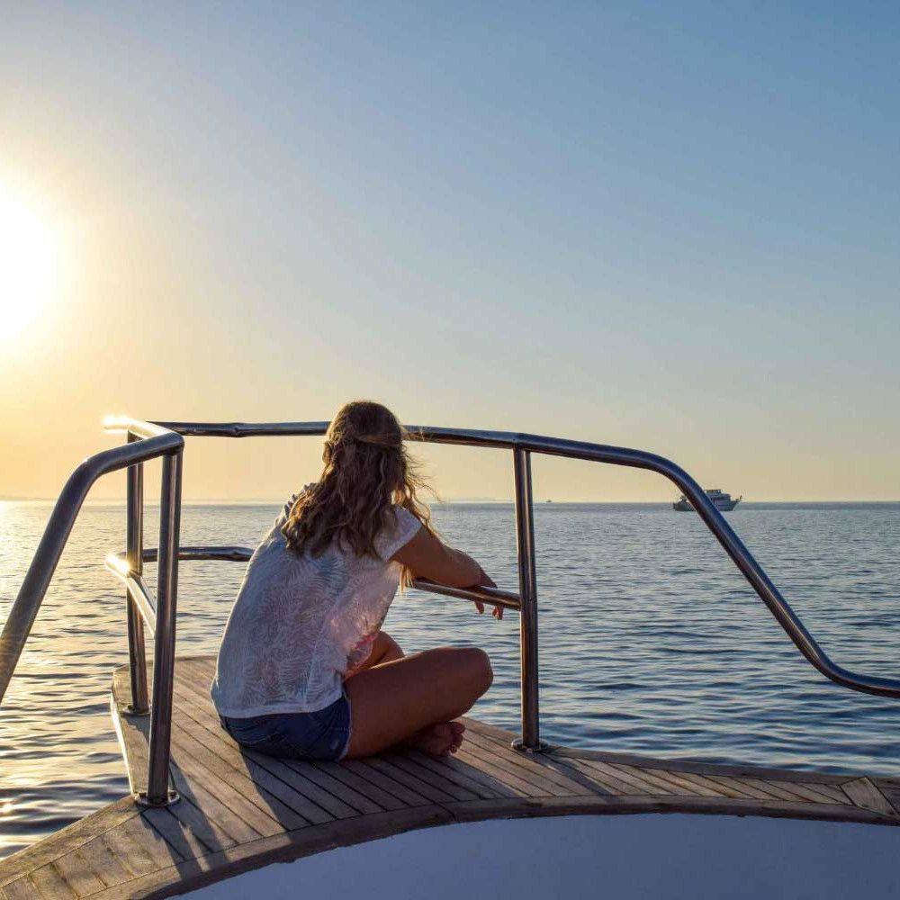 Woman Boat Reflecting